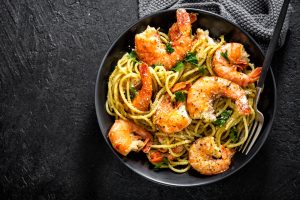Tasty,Appetizing,Pasta,Spaghetti,With,Pesto,Sauce,And,Shrimps,Served