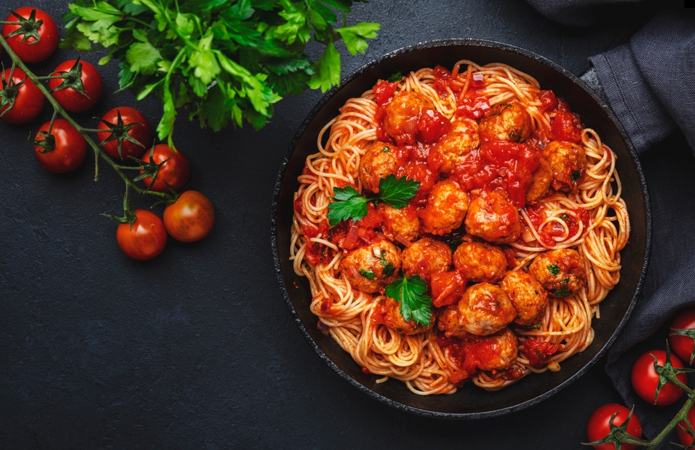 Chitarra Pasta with Meatballs. Sauce with capers and olives