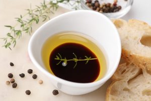 Balsamic vinegar in bowl with olive oil