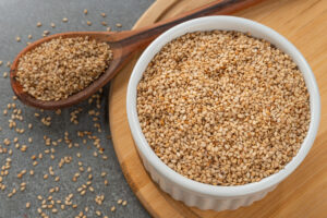 Bowl With White Sesame Seeds.Detail,Of,Wooden,Spoon