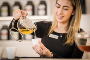 Serving tea at Zealong tea estate in New Zealand